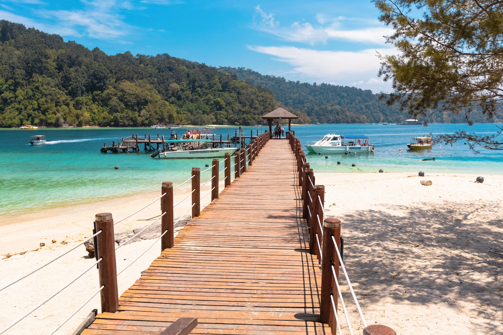 best places in asia to visit in may, best places to visit in asia in June, beach pier in Borneo