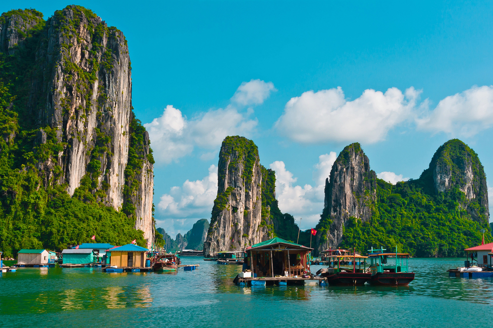 best countries to visit in May, Halong Bay water and village on water