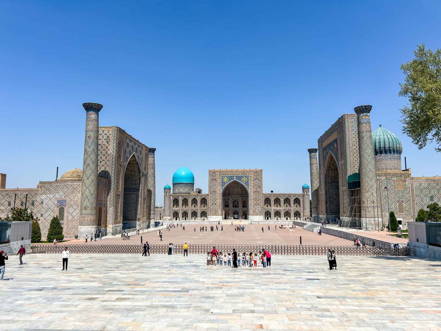 best places in asia to visit in may, best places to visit in asia in June, Square in Samarkand, Uzbekistan with blue skies