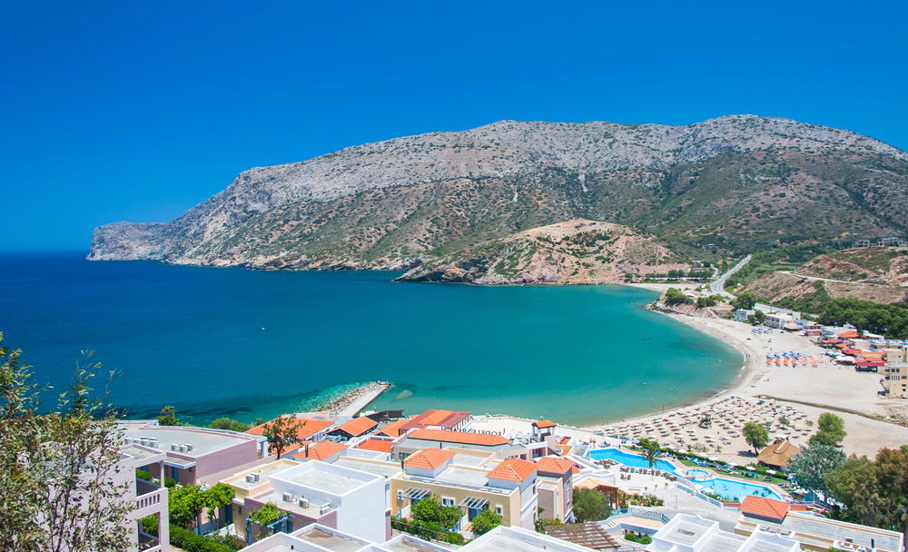best places to go in June europe, Crete beach with sand and hotels